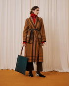 coat with fringes and belt