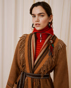 coat with fringes and belt